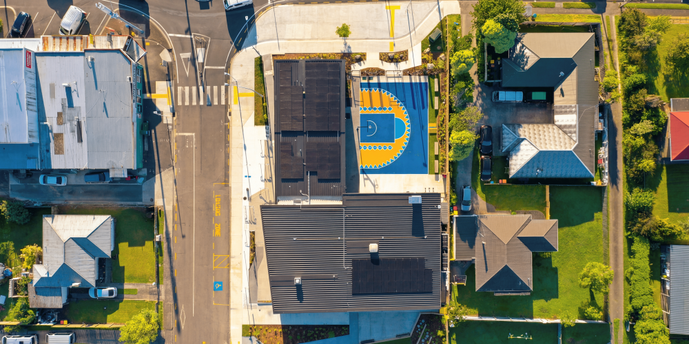 Aerial view of the Merivale Community Centre showing the building and outdoor half court